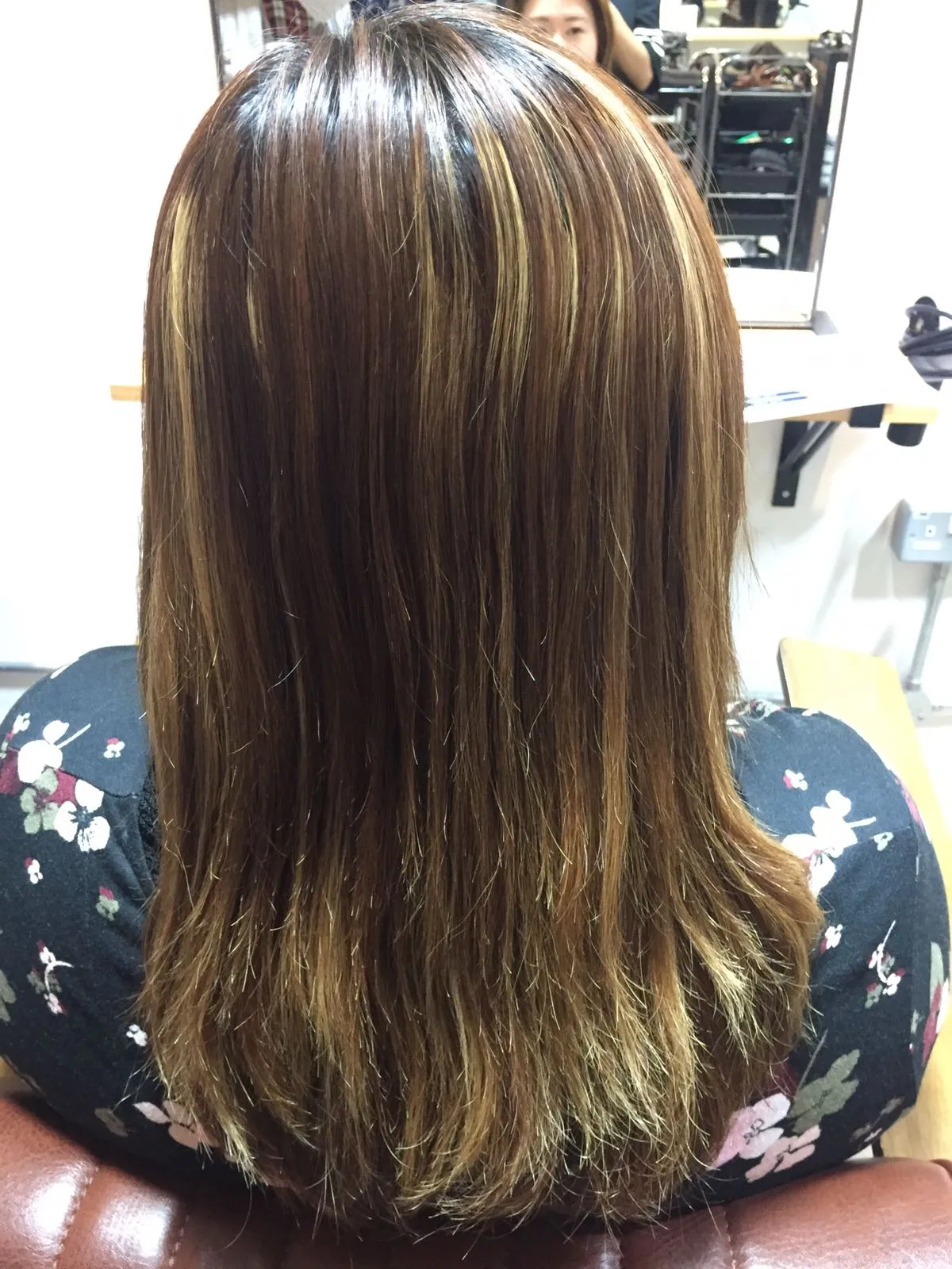 Woman with damaged hair after perm job done 5 months ago